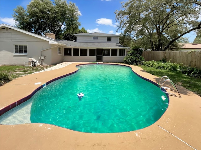 view of pool featuring a patio area