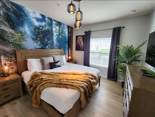 bedroom featuring light hardwood / wood-style flooring