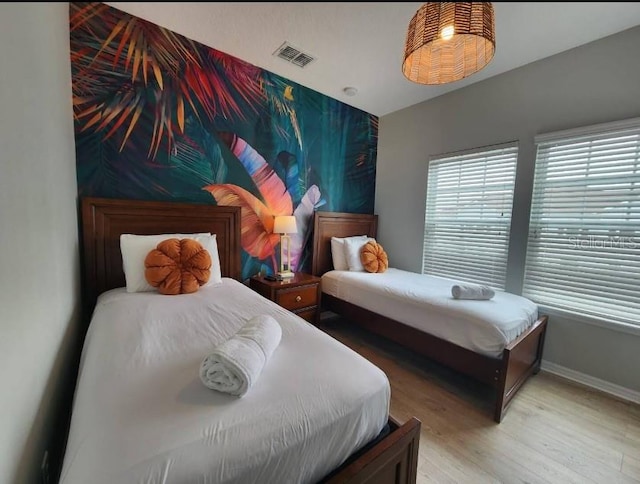 bedroom featuring light hardwood / wood-style flooring