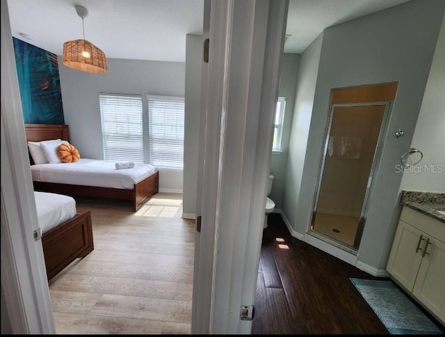 bedroom featuring light hardwood / wood-style floors