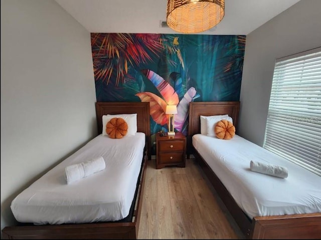 bedroom featuring hardwood / wood-style flooring