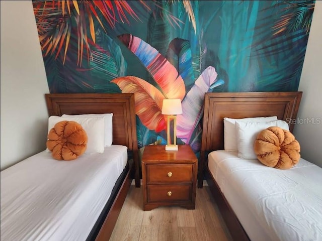 bedroom featuring light hardwood / wood-style floors