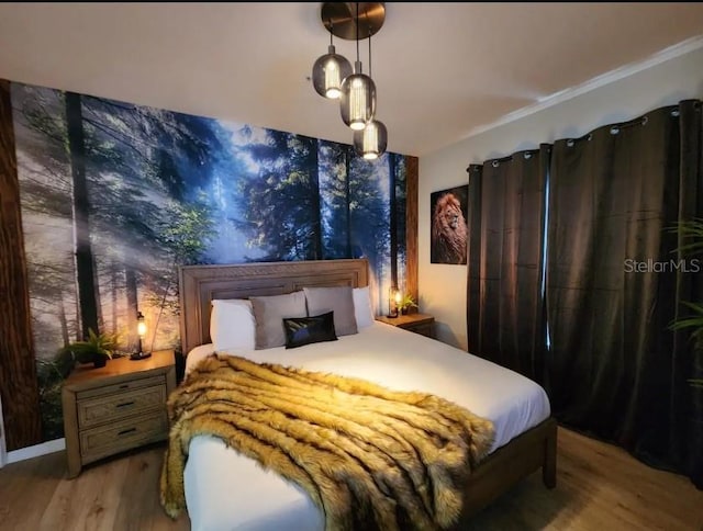 bedroom featuring hardwood / wood-style flooring