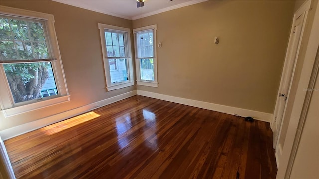 spare room featuring ceiling fan, crown molding, and hardwood / wood-style flooring