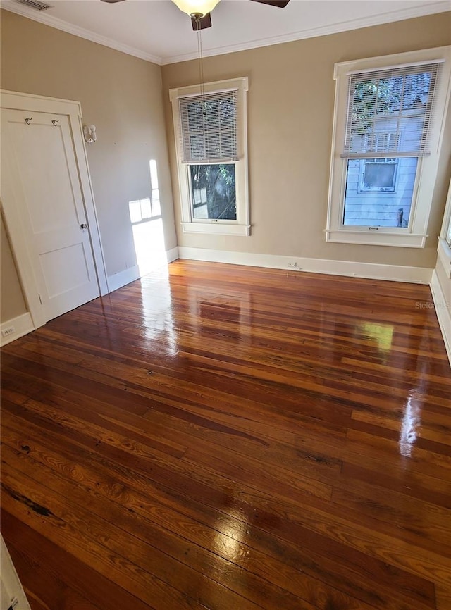 unfurnished room with crown molding, ceiling fan, and hardwood / wood-style floors