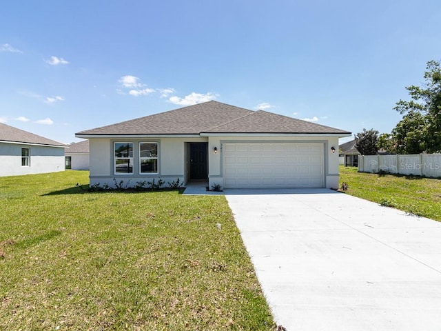 single story home with a front yard and a garage