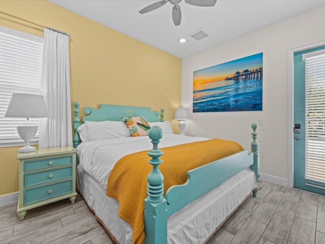 bedroom featuring ceiling fan and light hardwood / wood-style flooring