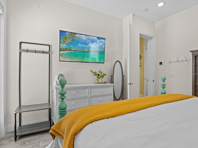 bedroom with light wood-type flooring