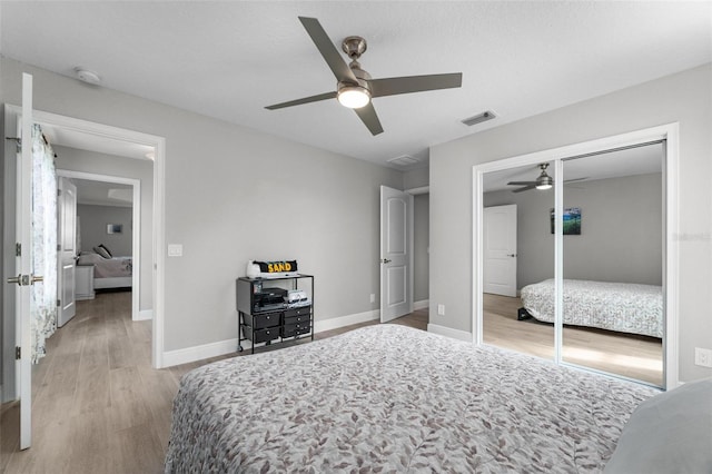 bedroom with a closet, ceiling fan, and light wood-type flooring