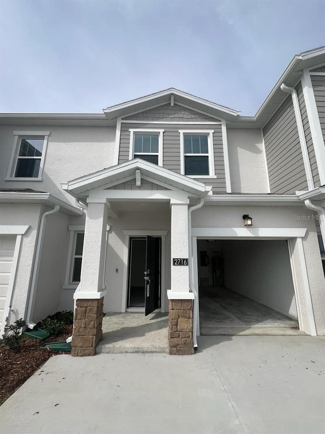 view of front of property featuring a garage