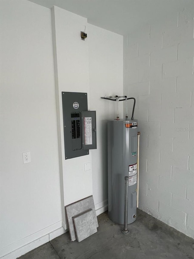 utility room featuring water heater