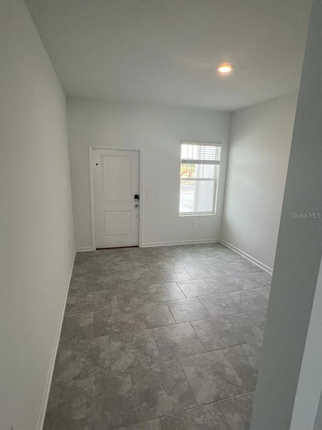 view of tiled spare room