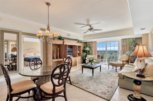 living room with light tile floors, crown molding, and ceiling fan with notable chandelier