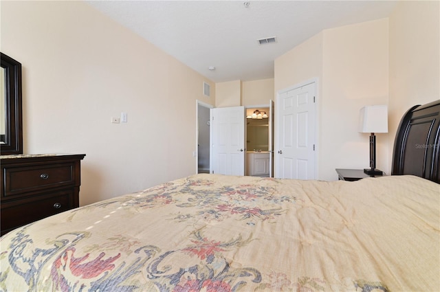 bedroom featuring ensuite bathroom