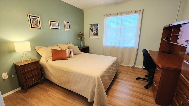 bedroom featuring light hardwood / wood-style floors