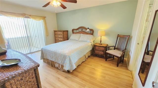 bedroom with ceiling fan and light wood-type flooring