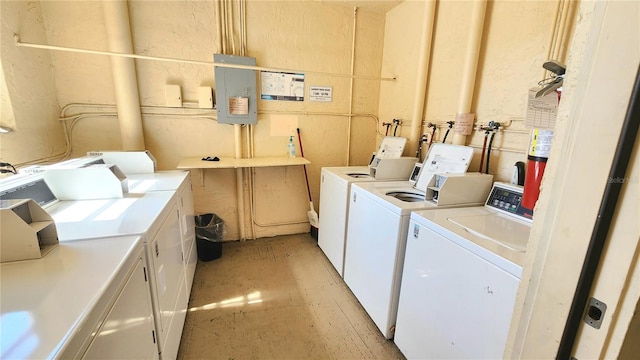 washroom with washing machine and clothes dryer and hookup for a washing machine