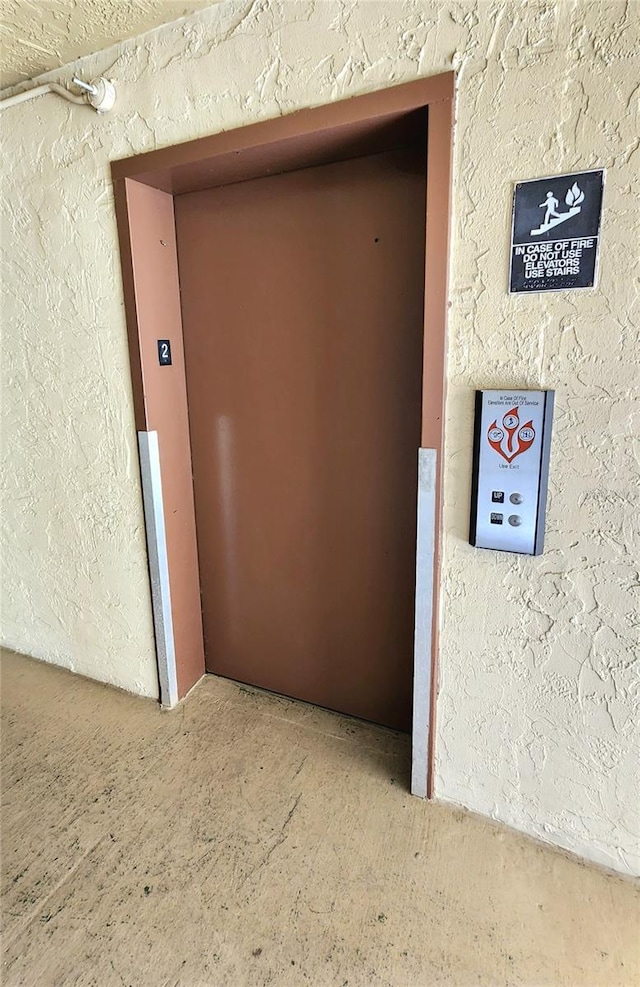 view of exterior entry with elevator