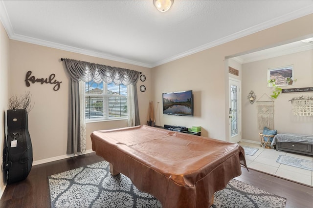 playroom with billiards, dark hardwood / wood-style flooring, and ornamental molding