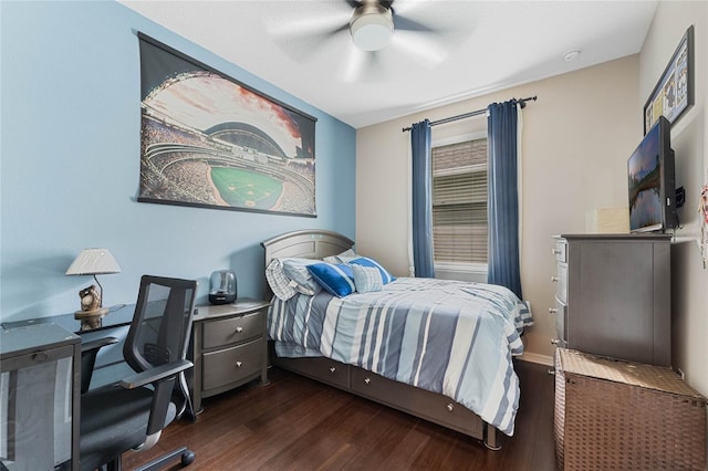 bedroom with ceiling fan and dark hardwood / wood-style floors