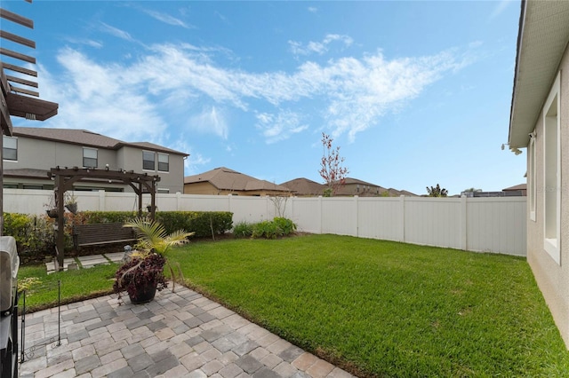 view of yard featuring a patio and a pergola