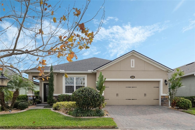 single story home featuring a garage