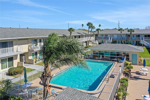 view of swimming pool featuring a patio