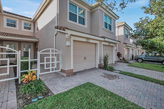 view of front of property with a garage