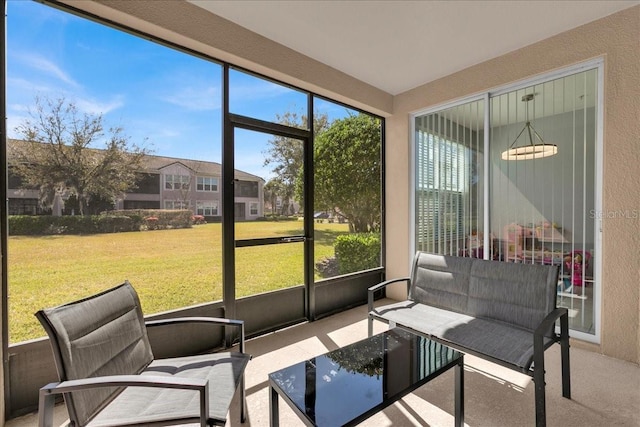 sunroom featuring a healthy amount of sunlight