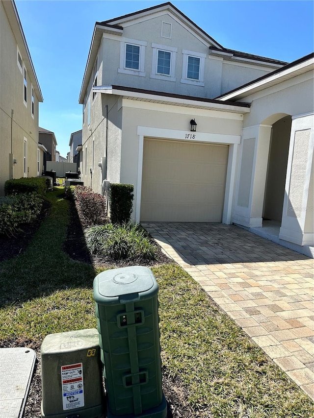 view of front of property with a garage