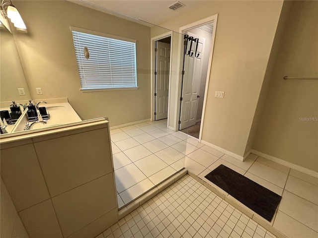 bathroom with tile floors