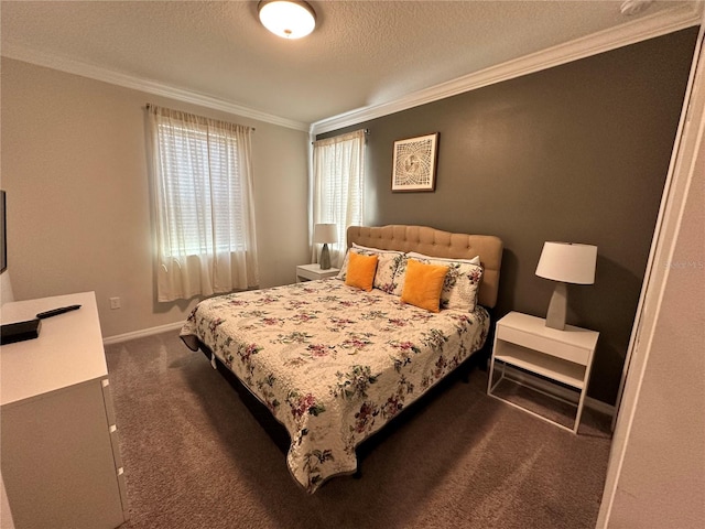 bedroom featuring ornamental molding, dark carpet, and a textured ceiling