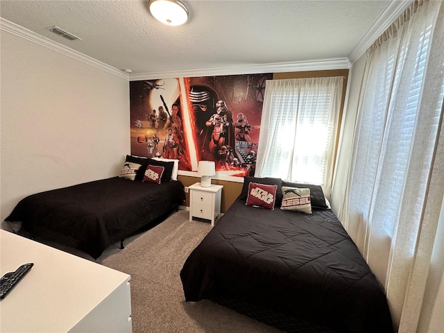 carpeted bedroom with ornamental molding and a textured ceiling