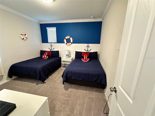 carpeted bedroom with a textured ceiling and crown molding