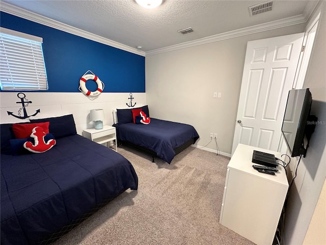 carpeted bedroom with crown molding and a textured ceiling