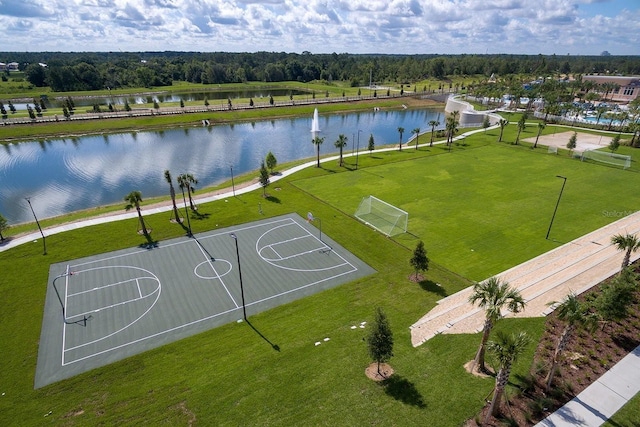 view of sport court featuring a water view