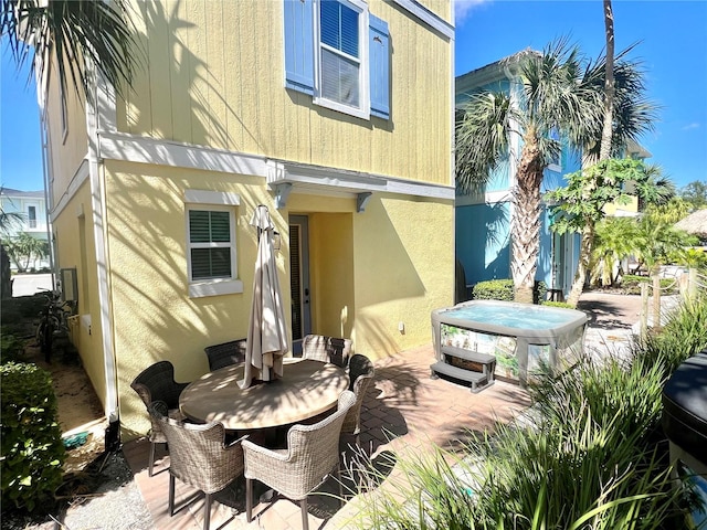 rear view of house with a patio