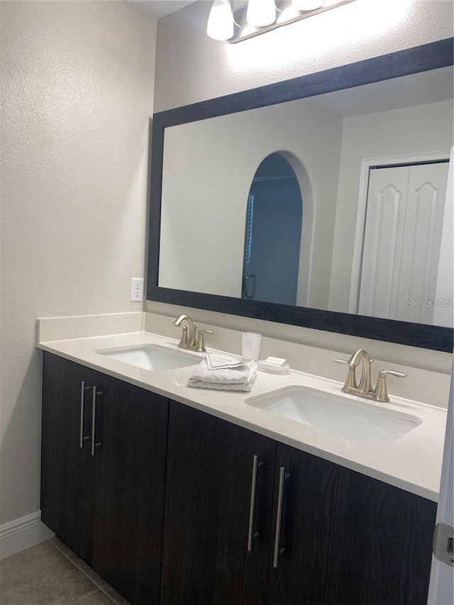 bathroom featuring vanity and tile patterned flooring