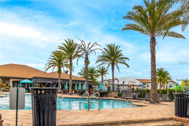 view of pool featuring a patio area