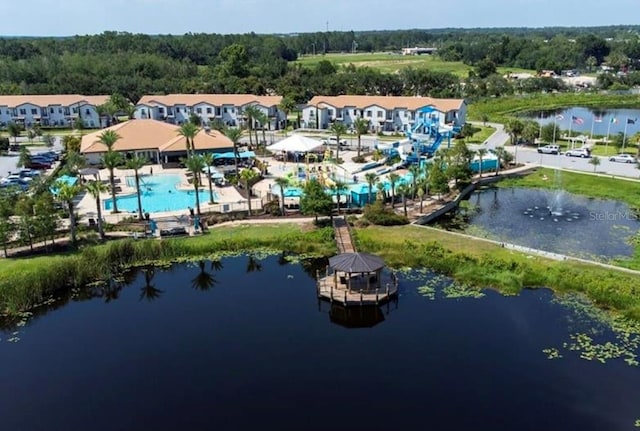 birds eye view of property featuring a water view