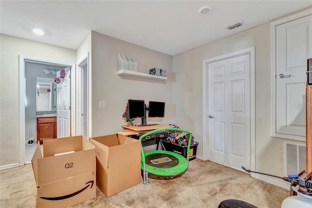 recreation room featuring light colored carpet