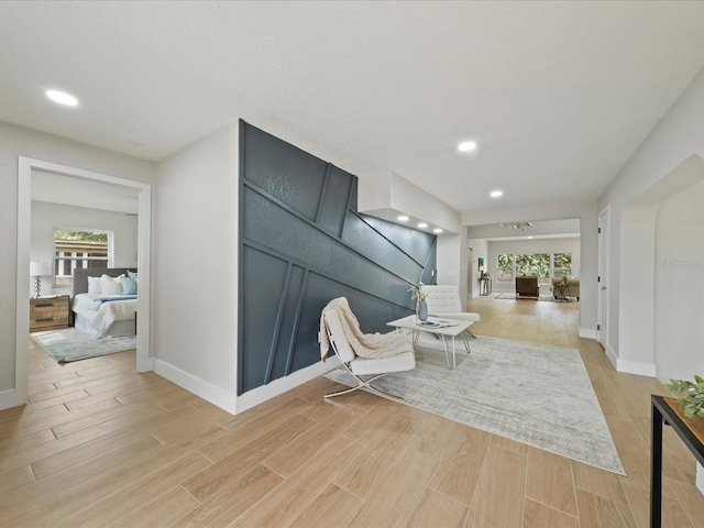 sitting room with light hardwood / wood-style flooring