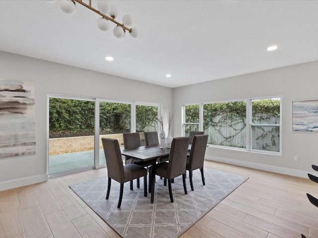 dining area with light wood-type flooring