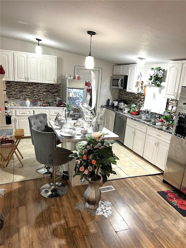 tiled dining area with sink