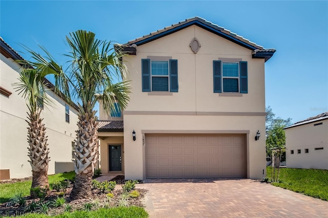 view of front of property with a garage