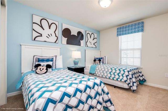 bedroom with light colored carpet