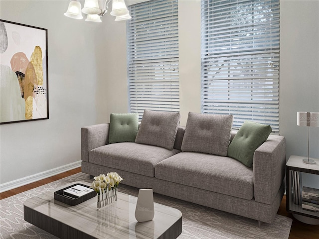 living room featuring hardwood / wood-style floors and a chandelier