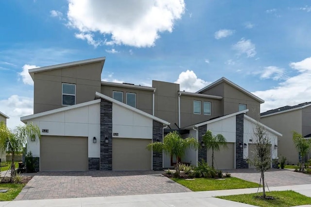 view of front of property featuring a garage