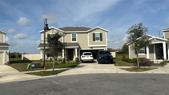 view of front facade featuring a garage and a front yard