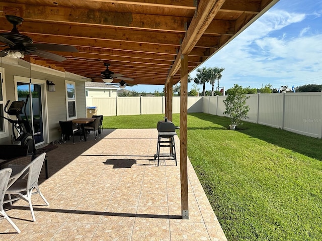 view of patio with ceiling fan